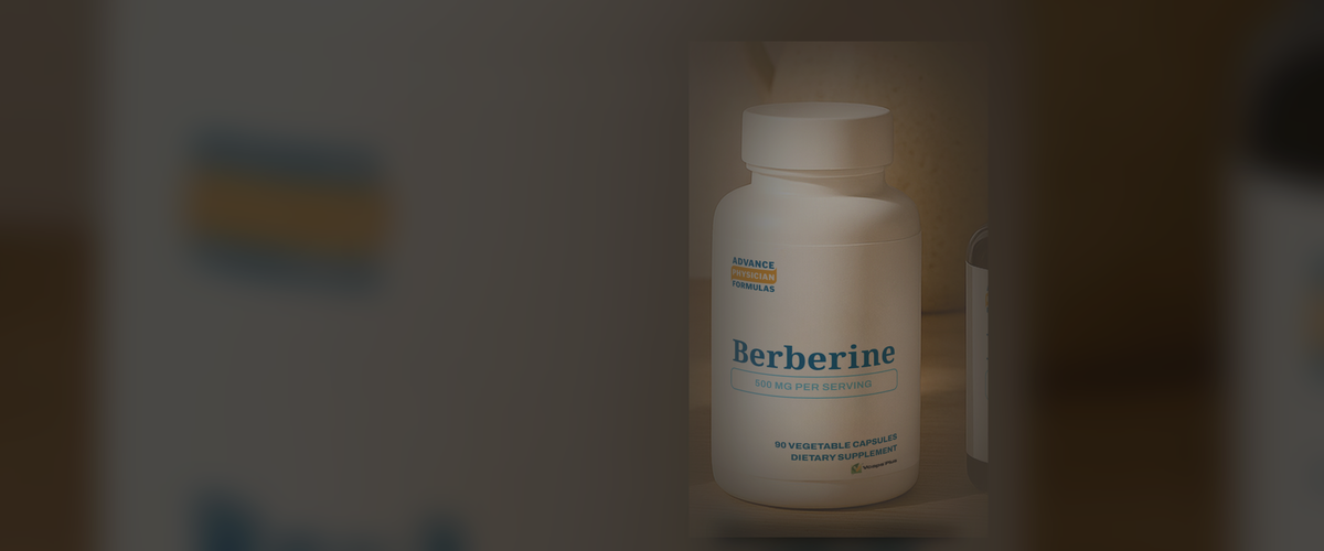 Advance Physician Formulas Berberine 500 mg bottle on a wooden counter