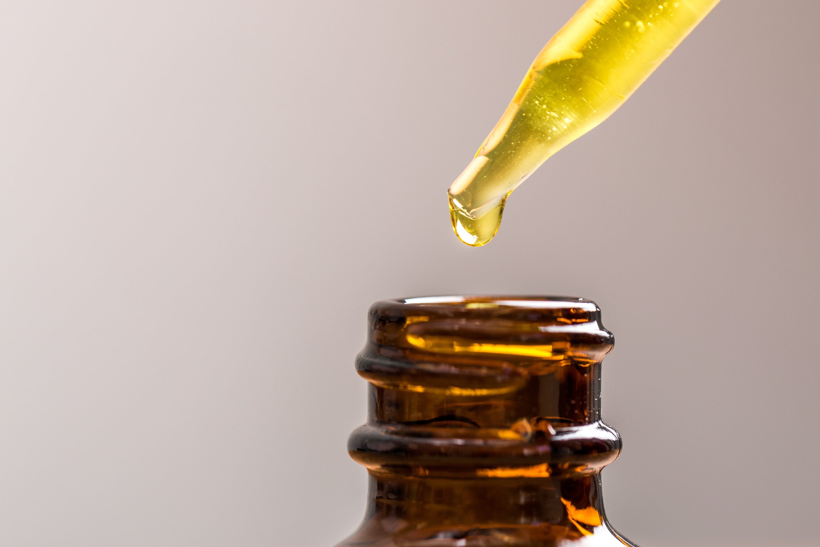 Oil being poured into bottle
